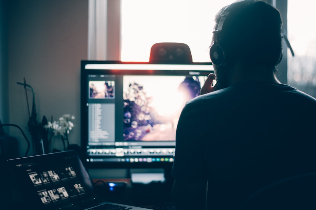 person editing photo on computer, I really love editing. Watching a picture come together as i edit along.